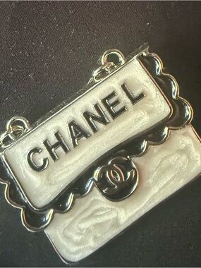 CHANEL White Enamel Logo Bag Charm with Silver-Tone Trim